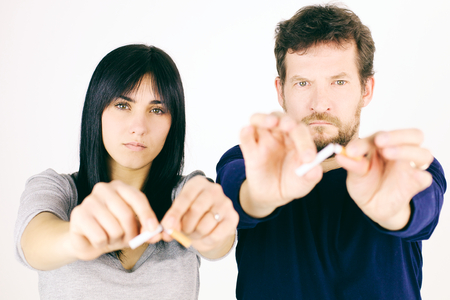 36288313 - Serious Couple Deciding To Stop Smoking